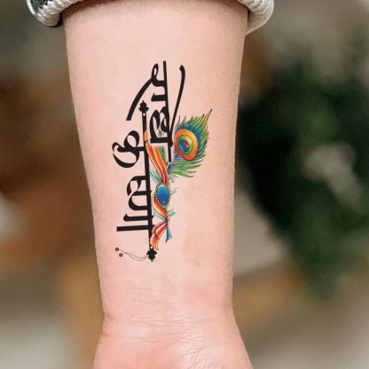 Krishna tattoo  krishna tattoo with feather  flute   Krishna tattoo  Tattoo designs for girls Flute tattoo